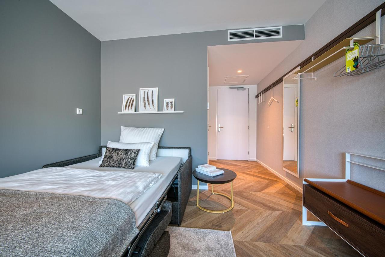 Отель Vienna House Easy By Wyndham Amsterdam Airport Schiphol Хоофддорп Экстерьер фото