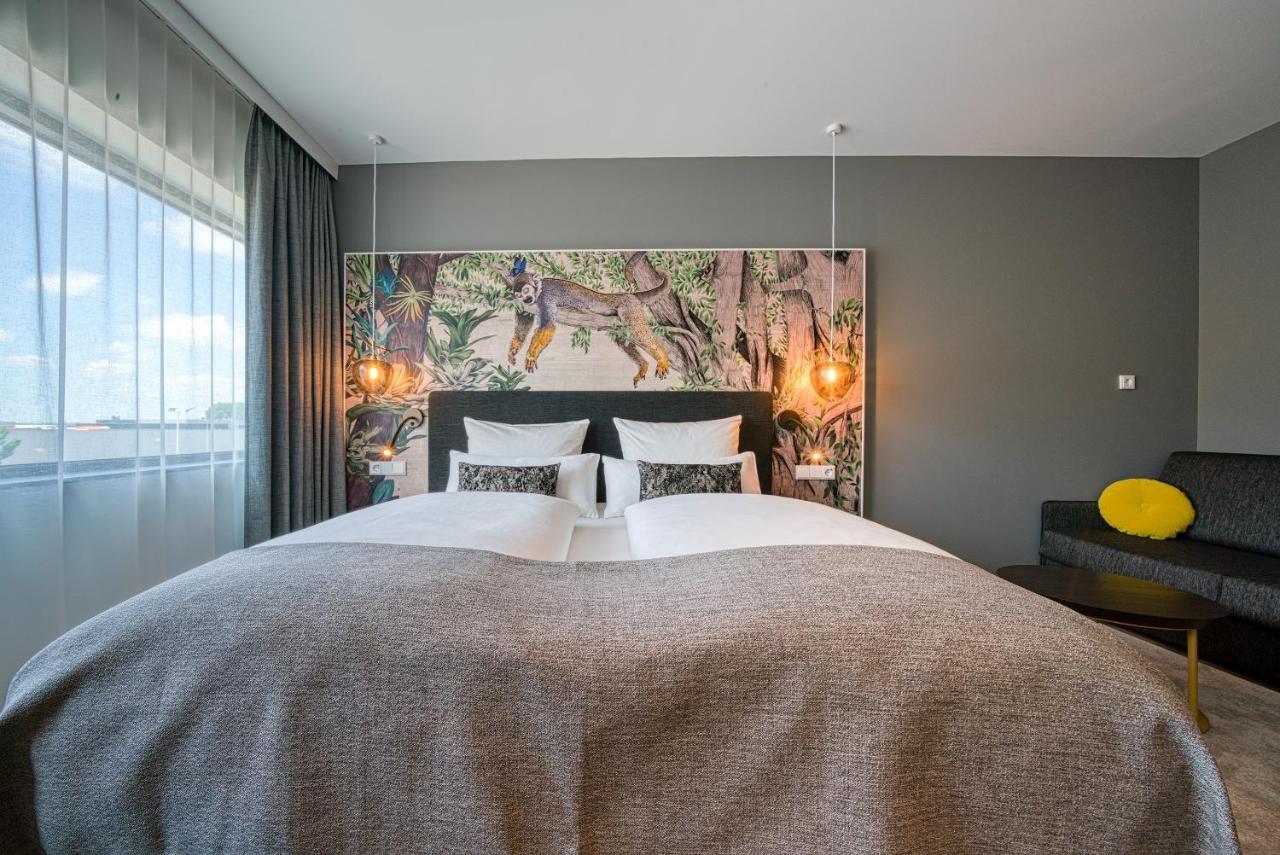 Отель Vienna House Easy By Wyndham Amsterdam Airport Schiphol Хоофддорп Экстерьер фото